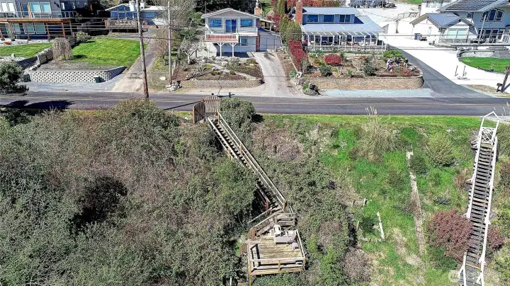Subject property and private beach access. Showcasing the unique setup and close proximity to the shoreline.