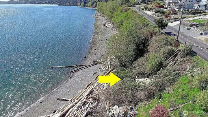 Private beach access just across the street with dedicated stairs leading to the shoreline—perfect for enjoying crabbing, kayaking, and waterfront living.