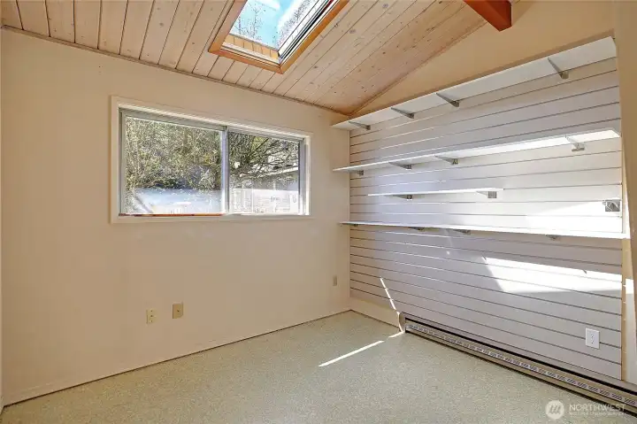 Guest bedroom on main floor with closet.