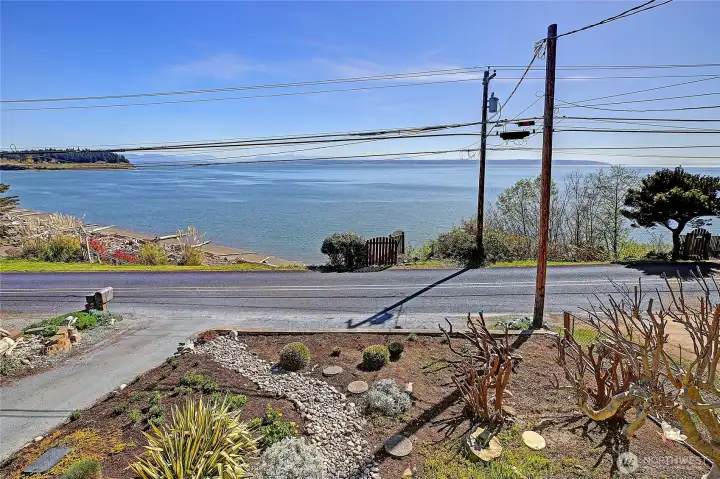 Enjoy beautiful water views with convenient beach access just steps away.
