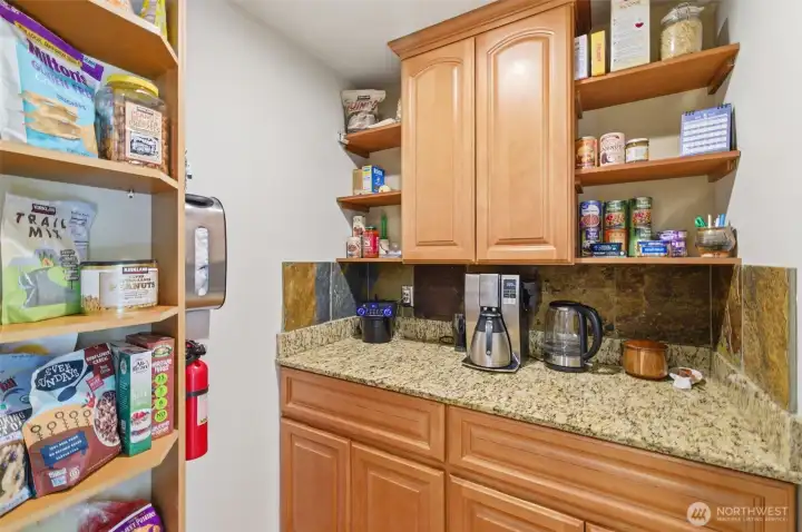Walk in pantry and coffee station off the kitchen.