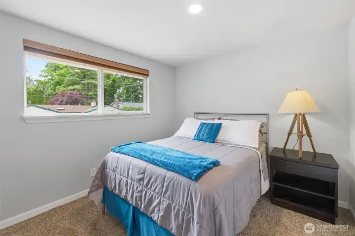 Bedroom 2 of 5 with West facing windows.