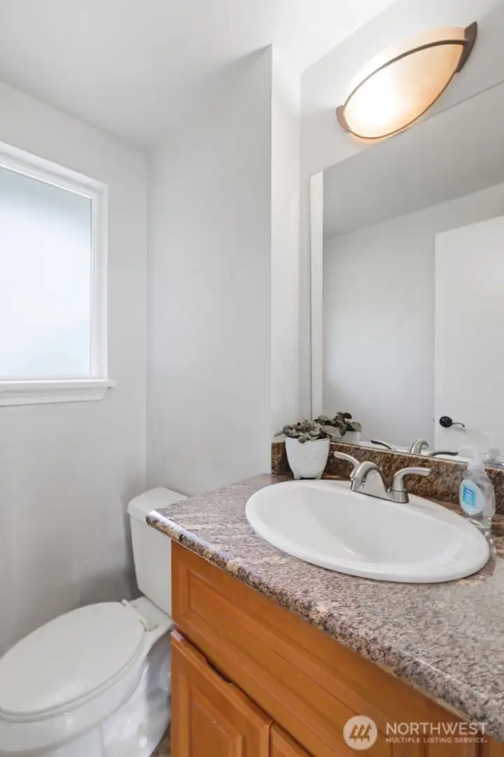 Half bath off the mudroom on the main floor