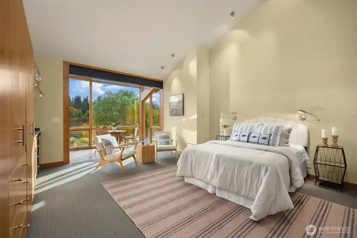 The guest space/studio mirrors the same high-quality finishes and attention to detail as the main home, featuring built-ins, a kitchenette, and a sleeping loft (not shown).