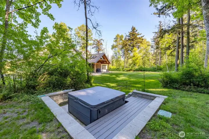 Hot tub with deck surround for easy access.