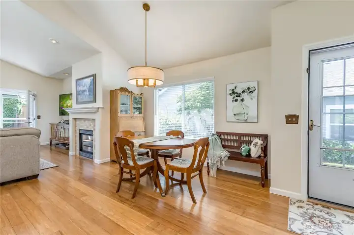 Bright dining area perfectly situated between the welcoming entry and cozy living room.