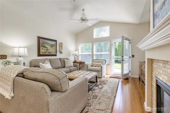 Impressive vaulted ceilings and an open-concept design make the living space feel grand yet cozy.