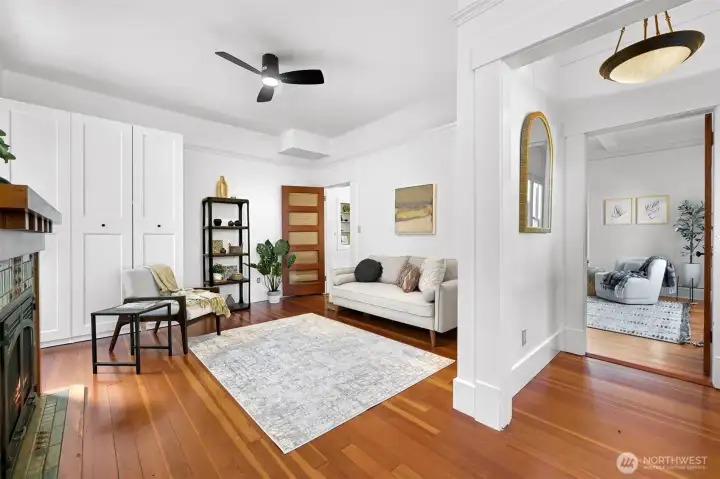 The den is located to the left of the entry and has been used as a TV room & library but could also function as a second main floor bedroom if desired The den is located to the left of the entry and has been used as a TV room & library but could also function as a second main floor bedroom if desired