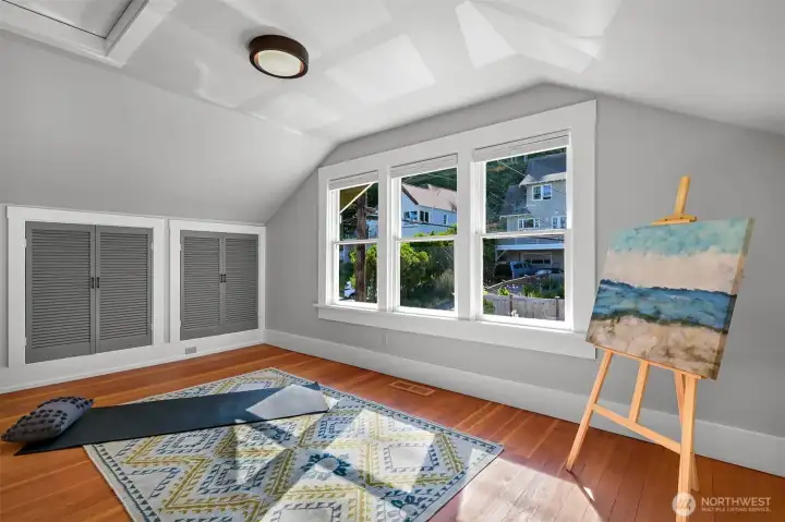 The back upstairs bedroom is flooded with light and offers lots of storage The back upstairs bedroom is flooded with light and offers lots of storage