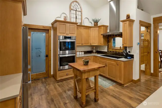 Double oven, walk-in pantry and butcher block table...a few features in the kitchen.