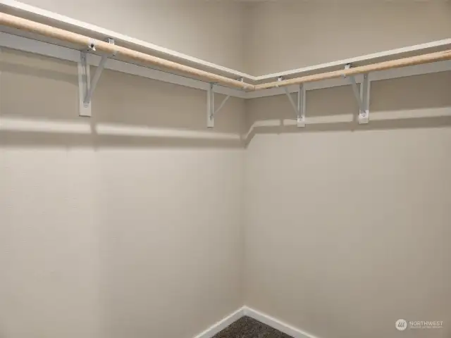 Deep walk-in Primary closet.