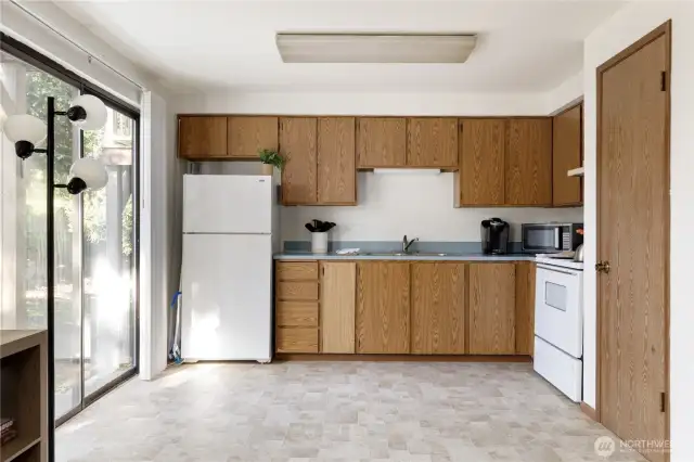 Kitchen with large pantry.  Living room and Kitchen are open to each other