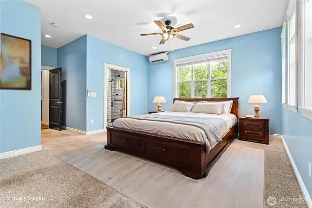 This space is massive. Enough for sleeping, living/sitting area, too. Virtually staged.