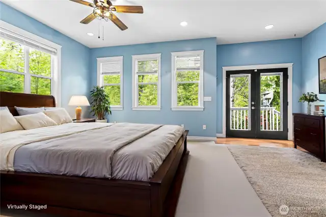 Those French doors lead to a small deck and fully-fenced private patio with an exit to the driveway. Virtually staged.