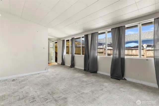 Lots of windows in the family room, and access to the back yard