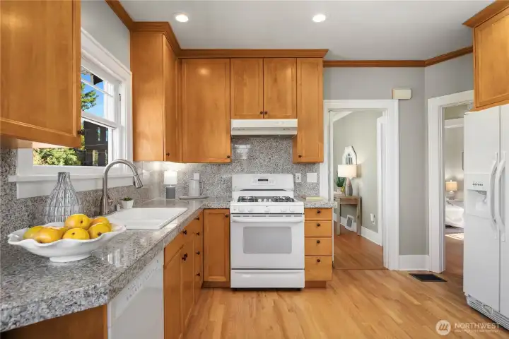 A gas range and generous cabinetry make this kitchen a chef-friendly space that’s as practical as it is inviting.