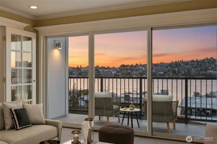 Enjoy breathtaking sunsets over Lake Union and the city skyline from your living room.