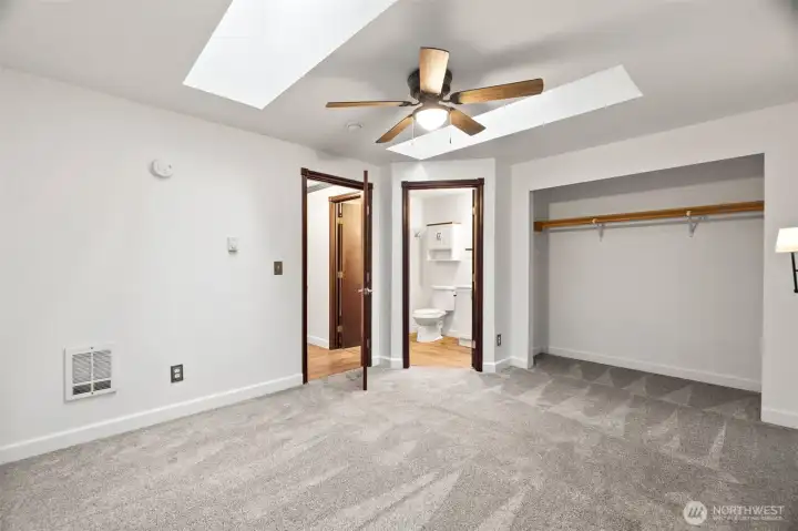Primary bedroom with en-suite bathroom.