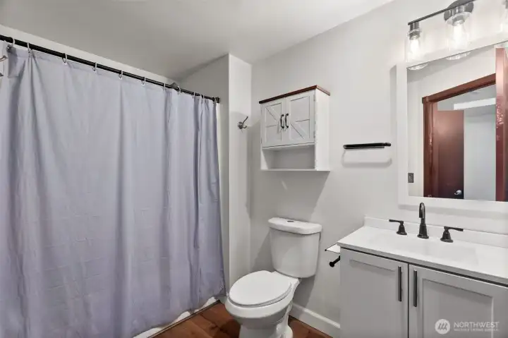 New vanities, toilets & light fixtures.