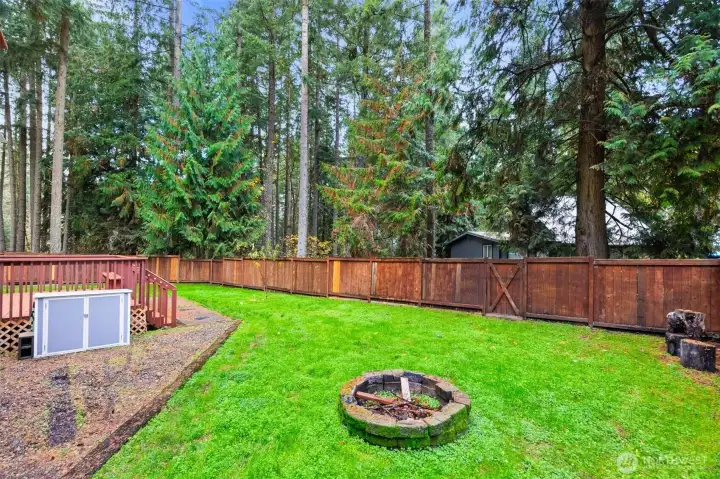 Fully fenced and fire pit.