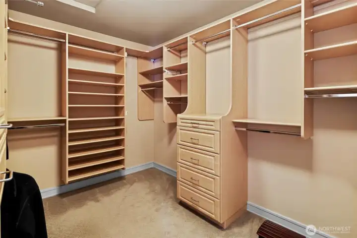 Primary closet with laundry shoot