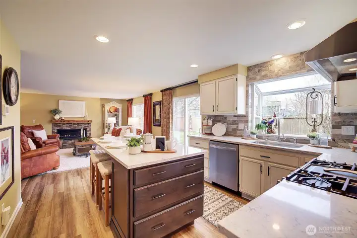 Big drawers in the island accommodate all your pots and pans! Plenty of cabinets and counterspace are featured too.