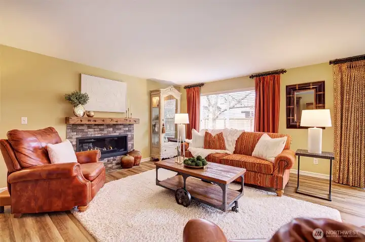 A linear fireplace also features a fan and turns on with a remote - so convenient!