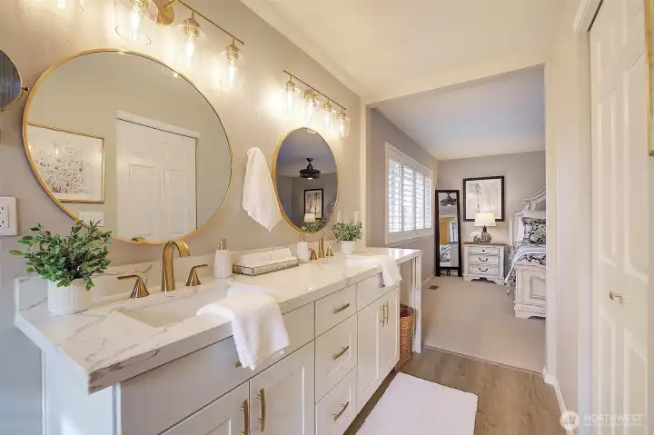 Isn't this bathroom dreamy?...(sigh)  Gorgeous gold finishes, glossy white cabinets with soft close drawers and quartzite counters...so nice!