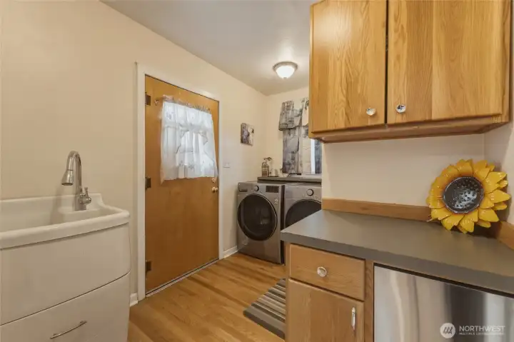 Main Floor Laundry Room With Exterior Access