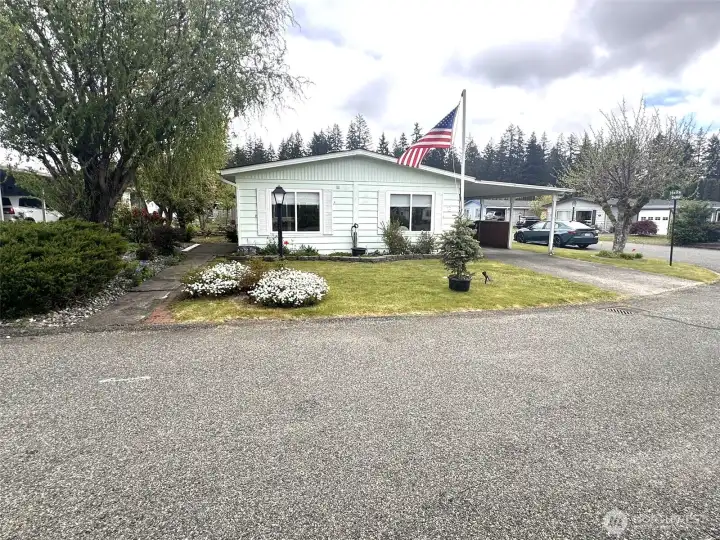 Front of House, nice corner lot with lots of parking