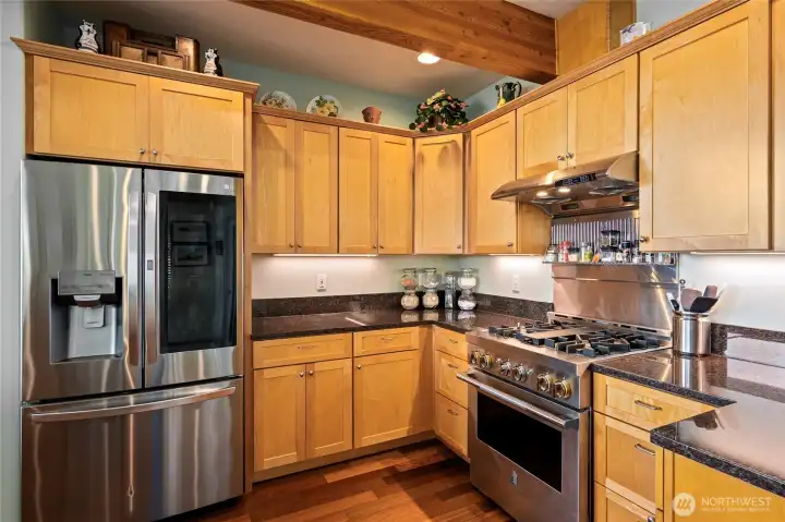 Stainless steel LG refrigerator/freezer, Jenn-Air Professional 36" Gas range/oven. Stainless steel LG refrigerator/freezer, Jenn-Air Professional 36" Gas range/oven.