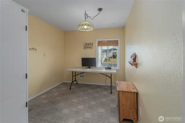bonus room off of kitchen, leads to garage