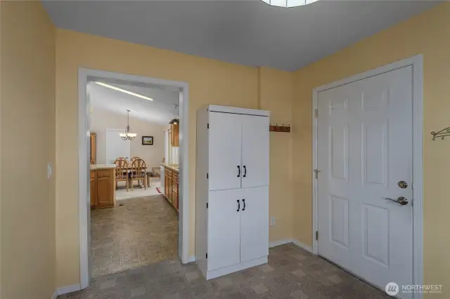 bonus room off of kitchen, leads to garage- no step entry