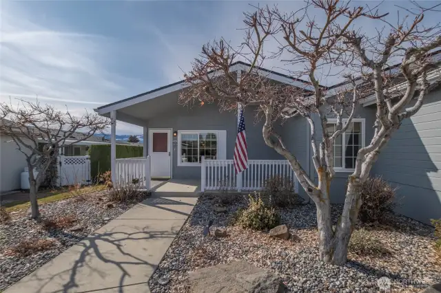 Easy care front yard landscaping- large covered front porch