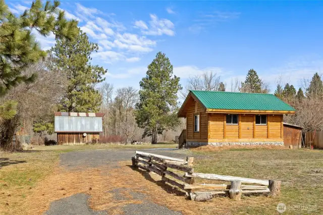 Cabin and barn on a level acre