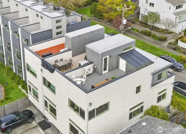 Fabulous roof top deck. Entertain, enjoy the added space, and a plus a built in storage room.