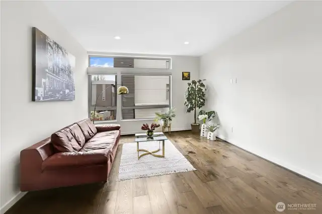 Living room with  wonderful wood flooring.
