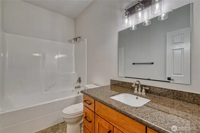 Another view of the spotless bathroom.