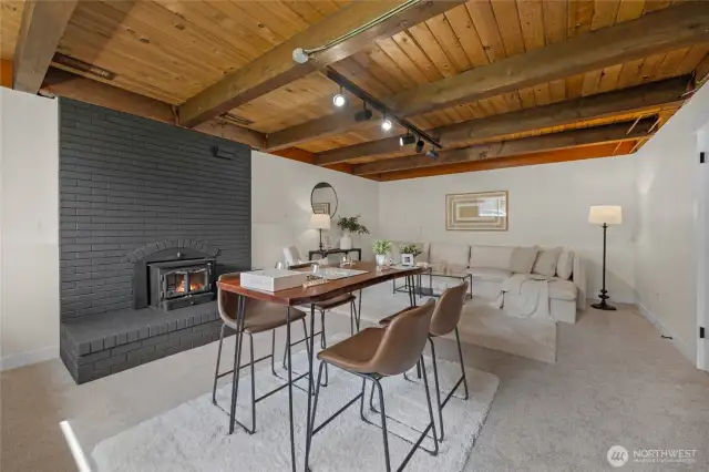 Lower level living room with wood stove insert