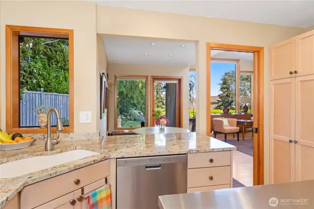 The spacious kitchen is light and bright and has granite counters and ample storage. All appliances convey, including a rather new washer & dryer.