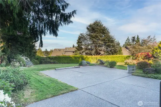 This lovely, private back yard faces East and has filtered views of Port Townsend Bay. Plenty of room to BBQ, garden, relax, read, and enjoy life.