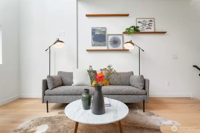 Spacious living room, with engineered hardwood floors.
