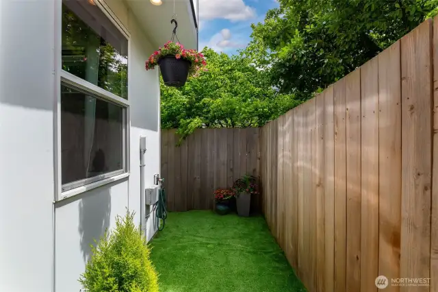 This end unit features your own partially fenced private yard area that forms a U, running along the sides and back of the home. It's all yours!