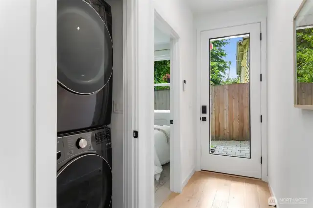 Light & bright entry with the a bedroom, full bath, and laundry on this level.