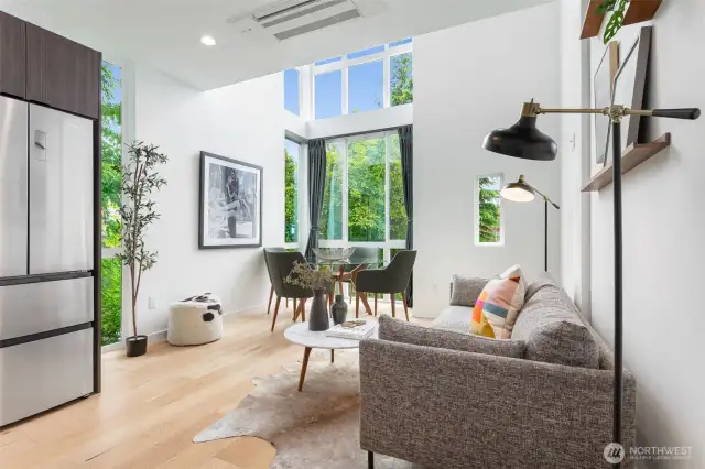Double height living/dining area on main floor.