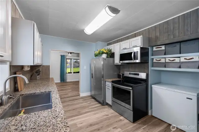 Lovely kitchen with Granite Countertops and Stainless Steel appliances.