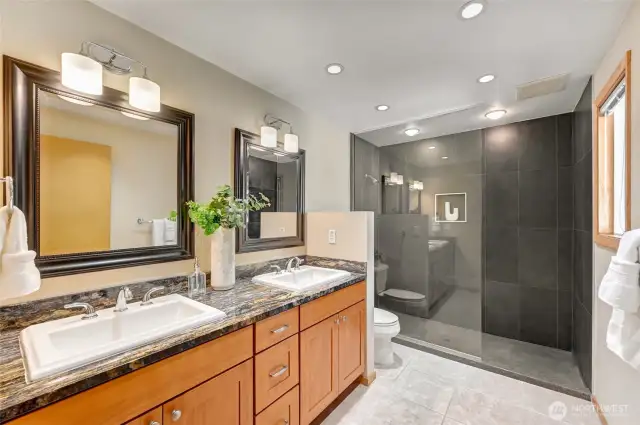 Spacious primary bathroom upstairs
