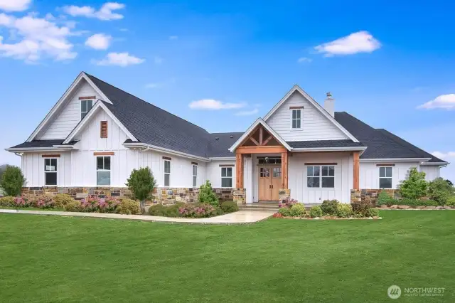 Photo is the architects rendering.  Builder reserves the right to make changes at any time during construction without notice.