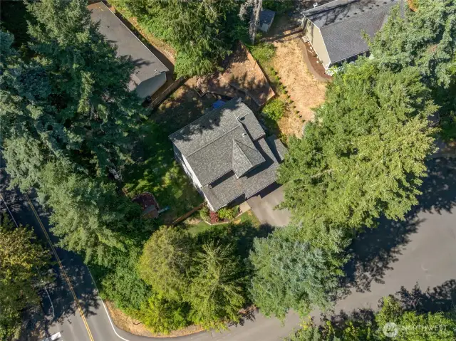 This corner lot is just shy of a quarter-acre and is near the Clearwood community gate—easy in and out. Across the street is a private beach along Horseshoe Lake!