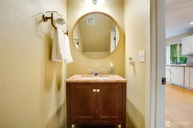Half bath on the main floor with an updated vanity